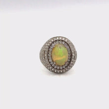 Загружайте и воспроизводите видео в средстве просмотра галереи Ethiopian Opal with Diamonique Oval shape Ring in Sterling Silver
