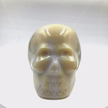 Load and play video in Gallery viewer, 360 view of Calcedony skull head figure
