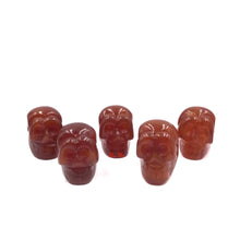 将图片加载到图库查看器，Carnelian skull head pendants 
