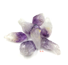 将图片加载到图库查看器，Collection of amethyst point rough stones
